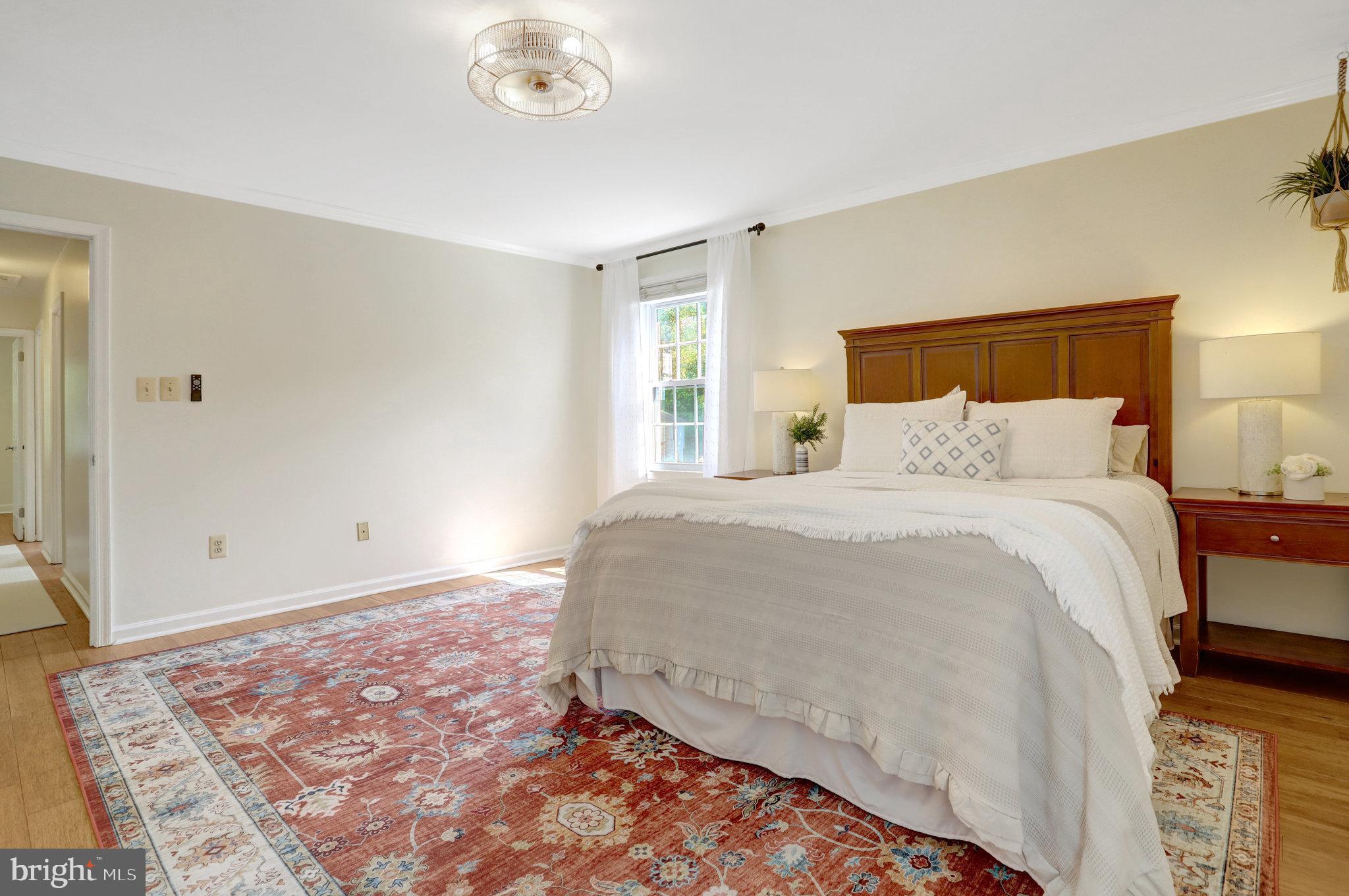 7206 Joshua Tree Lane Springfield, VA 22152 - Photo 22 of 50 Serene bedroom with natural light and charm.