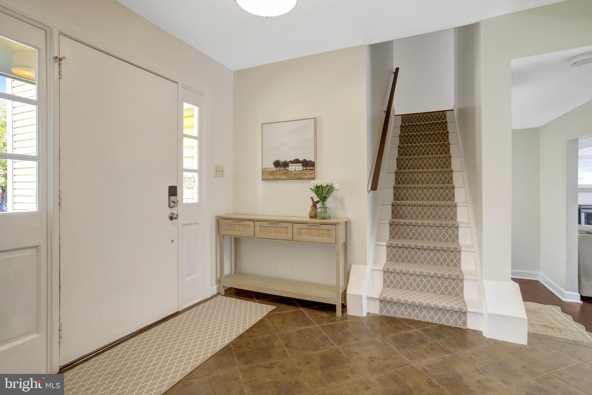 7206 Joshua Tree Lane Springfield, VA 22152 - Photo 3 of 50 Welcoming entryway with elegant staircase.