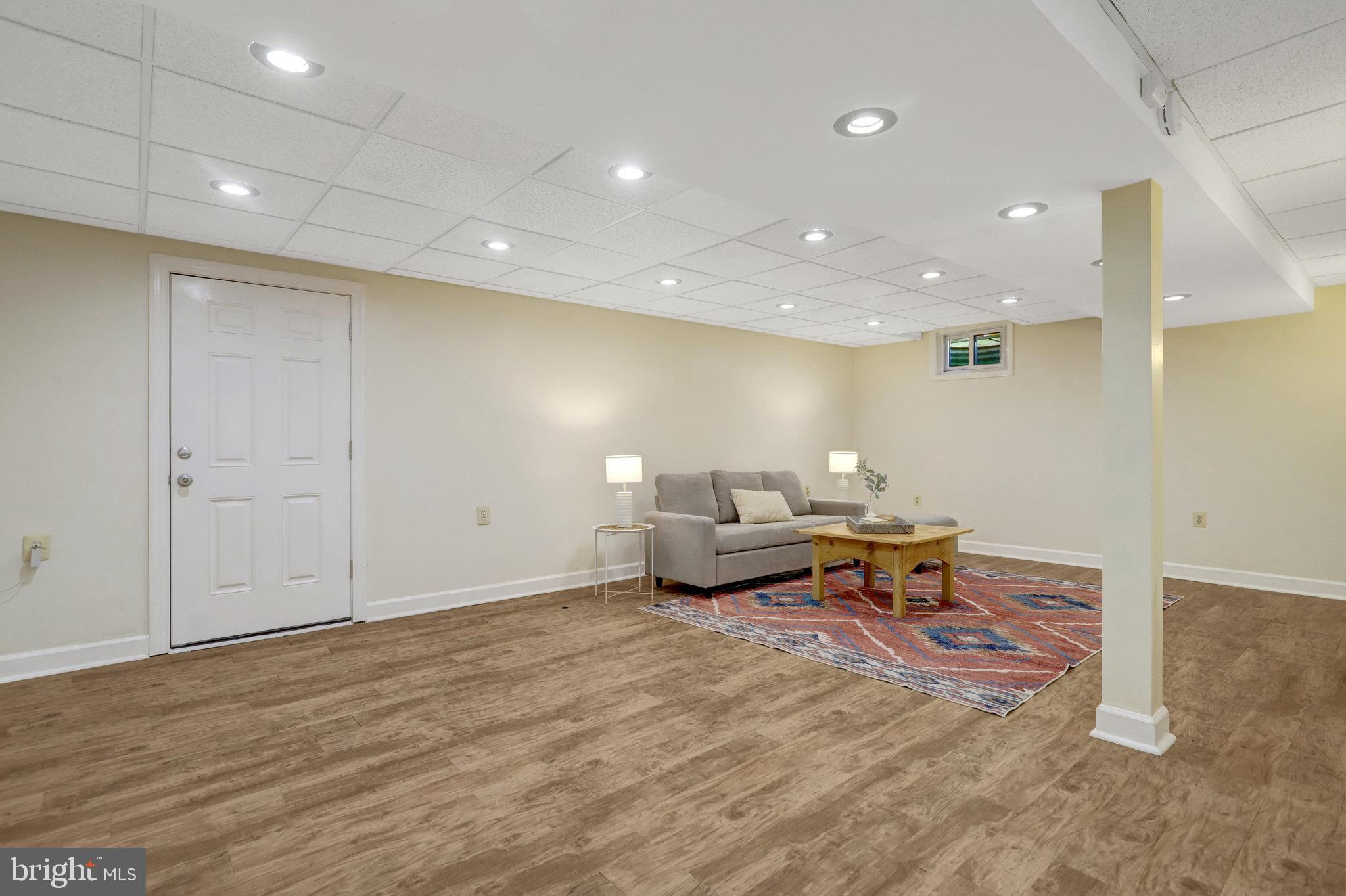 7206 Joshua Tree Lane Springfield, VA 22152 - Photo 35 of 50 Lower Level has walk up stairwell to the backyard.