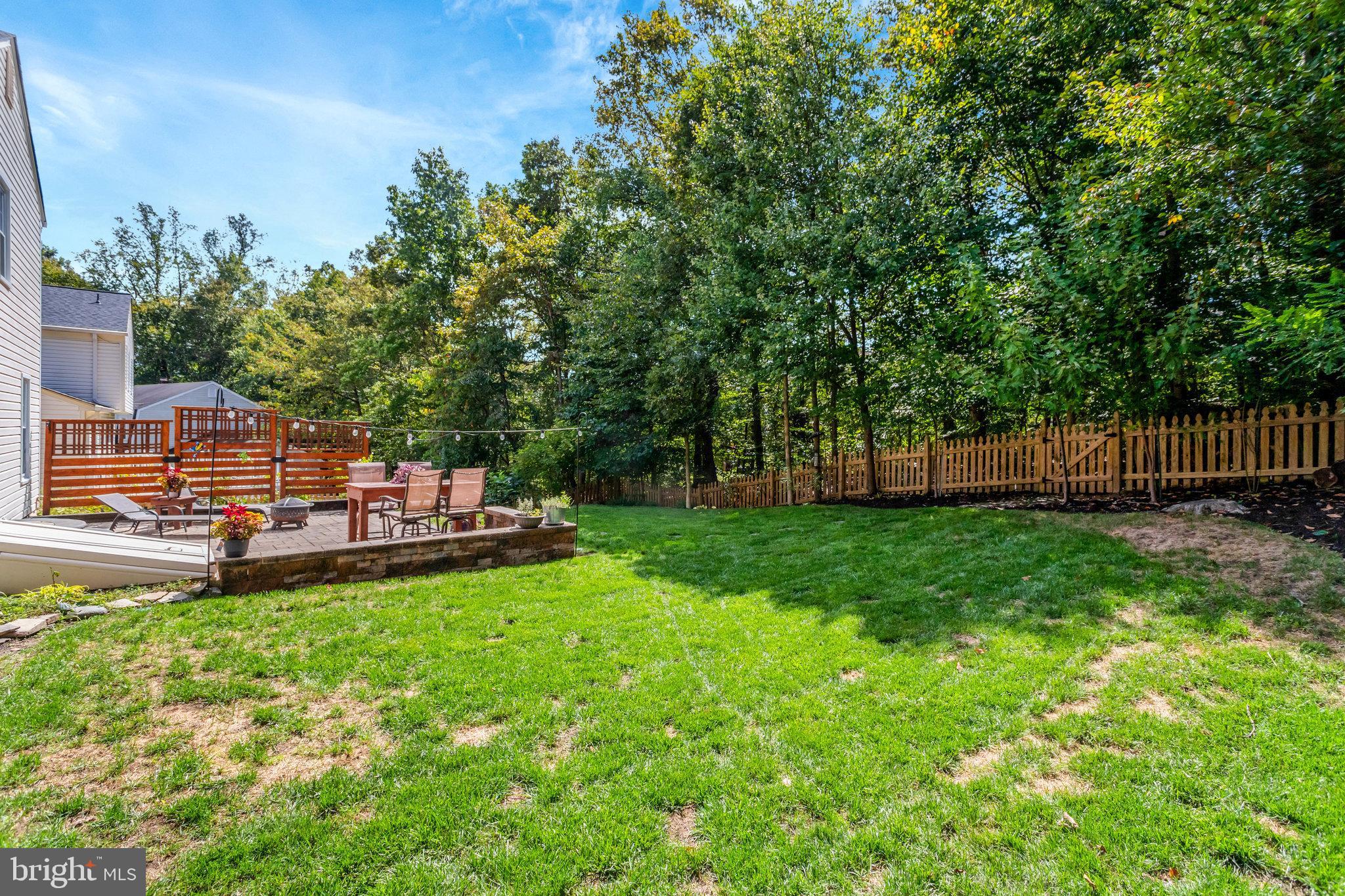 7206 Joshua Tree Lane Springfield, VA 22152 - Photo 41 of 50 Large fenced backyard that backs to trees