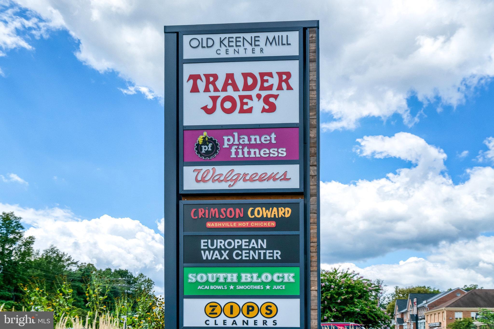 7206 Joshua Tree Lane Springfield, VA 22152 - Photo 46 of 50 Vibrant shopping center sign under blue skies.