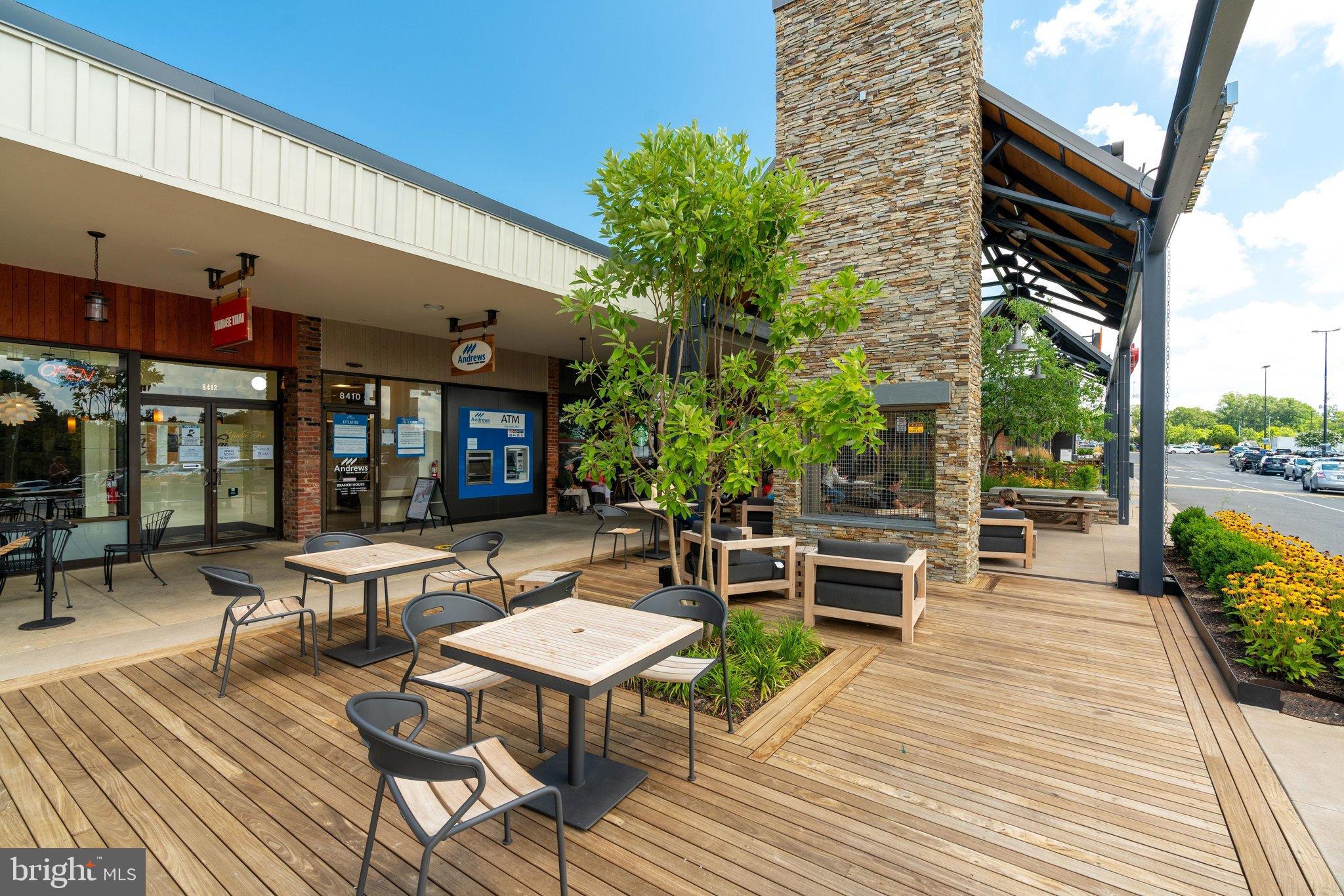 7206 Joshua Tree Lane Springfield, VA 22152 - Photo 49 of 50 Charming outdoor dining space with greenery.