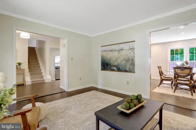a living room with furniture and window