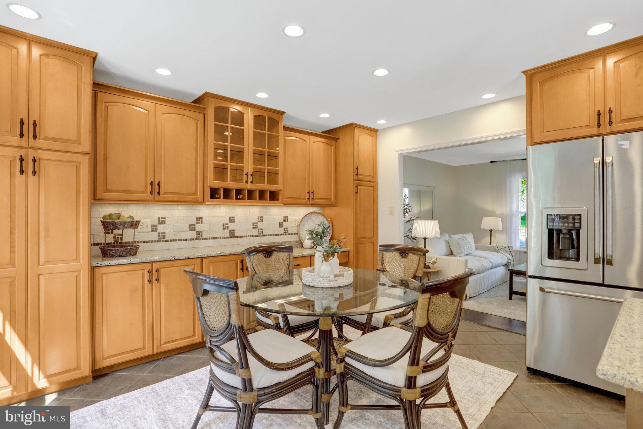 7206 Joshua Tree Lane Springfield, VA 22152 - Photo 8 of 50 Warm, inviting kitchen with elegant finishes.