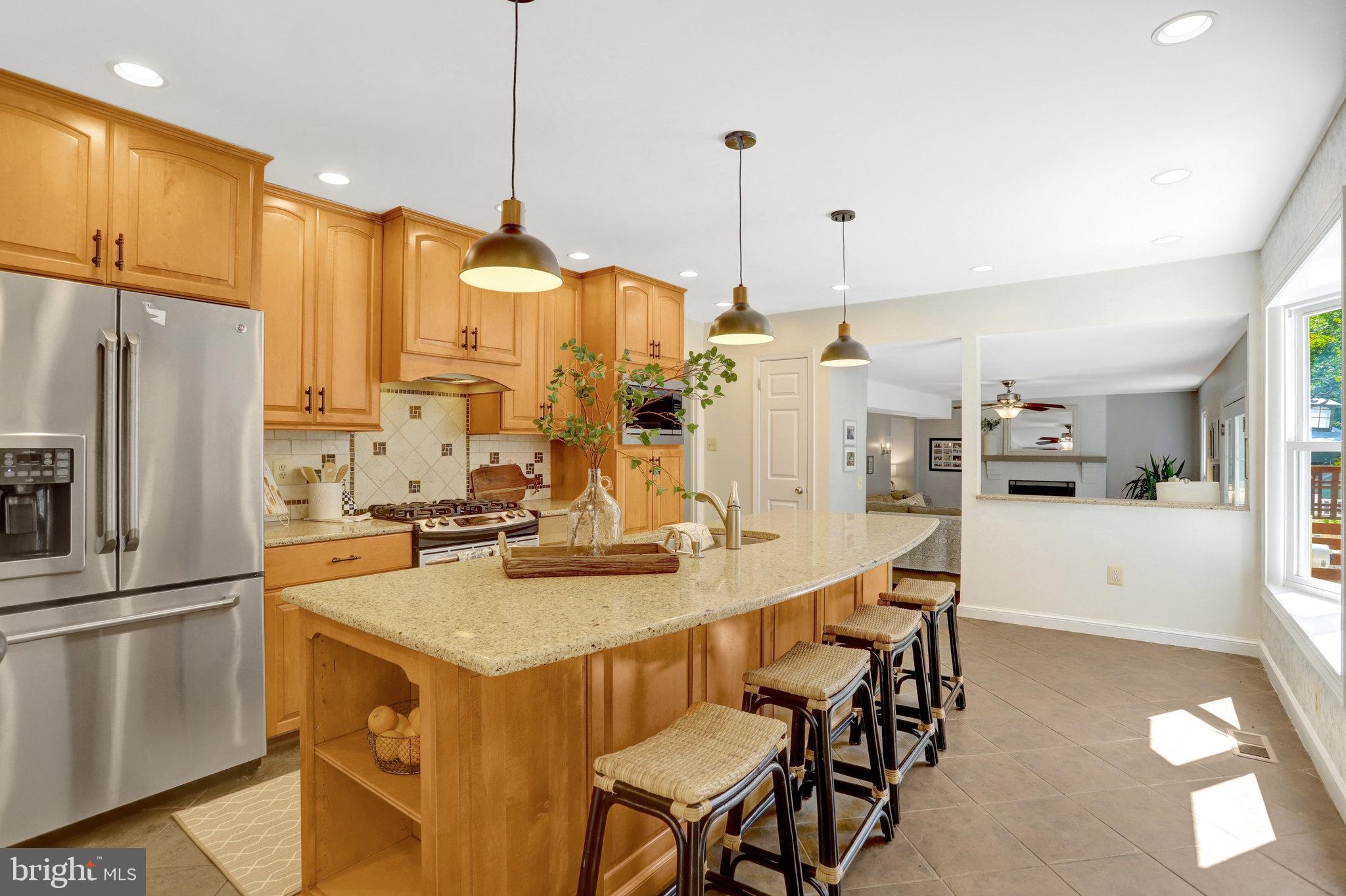 7206 Joshua Tree Lane Springfield, VA 22152 - Photo 9 of 50 Warm and inviting kitchen with modern charm.