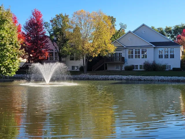 a front view of a house with swimming pool