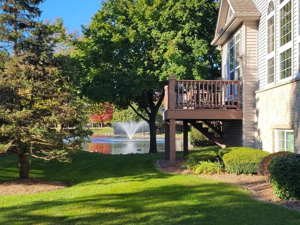 a view of a house with a small yard
