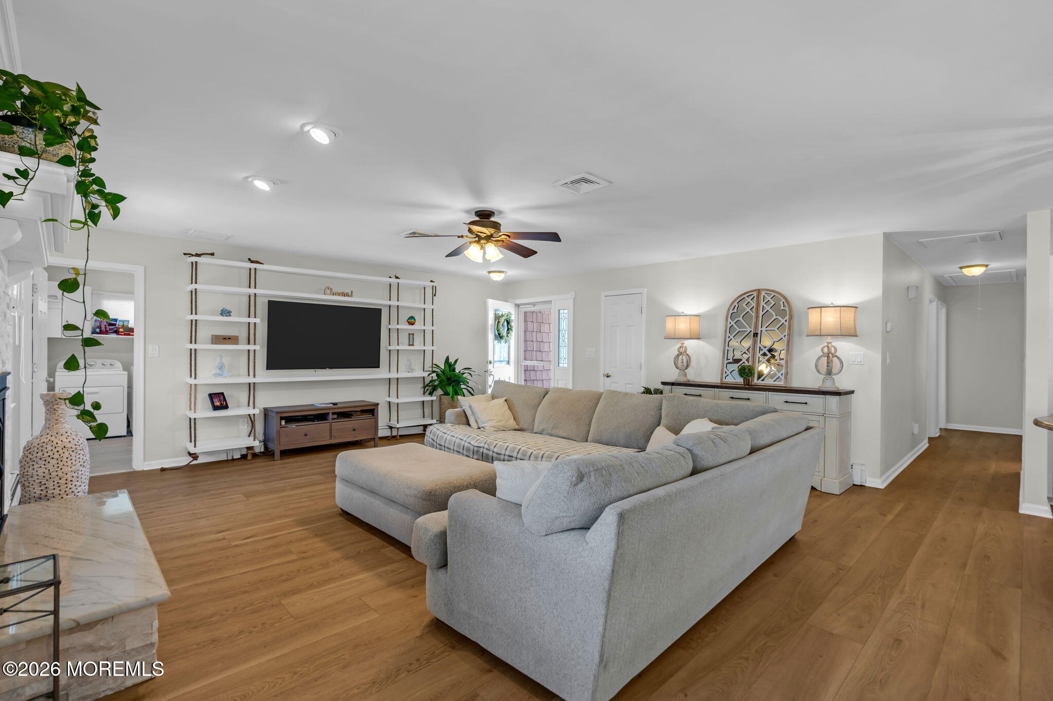 30 Channel Road Toms River, NJ 08753 - Photo 5 of 28 Living Room with Fireplace and TV