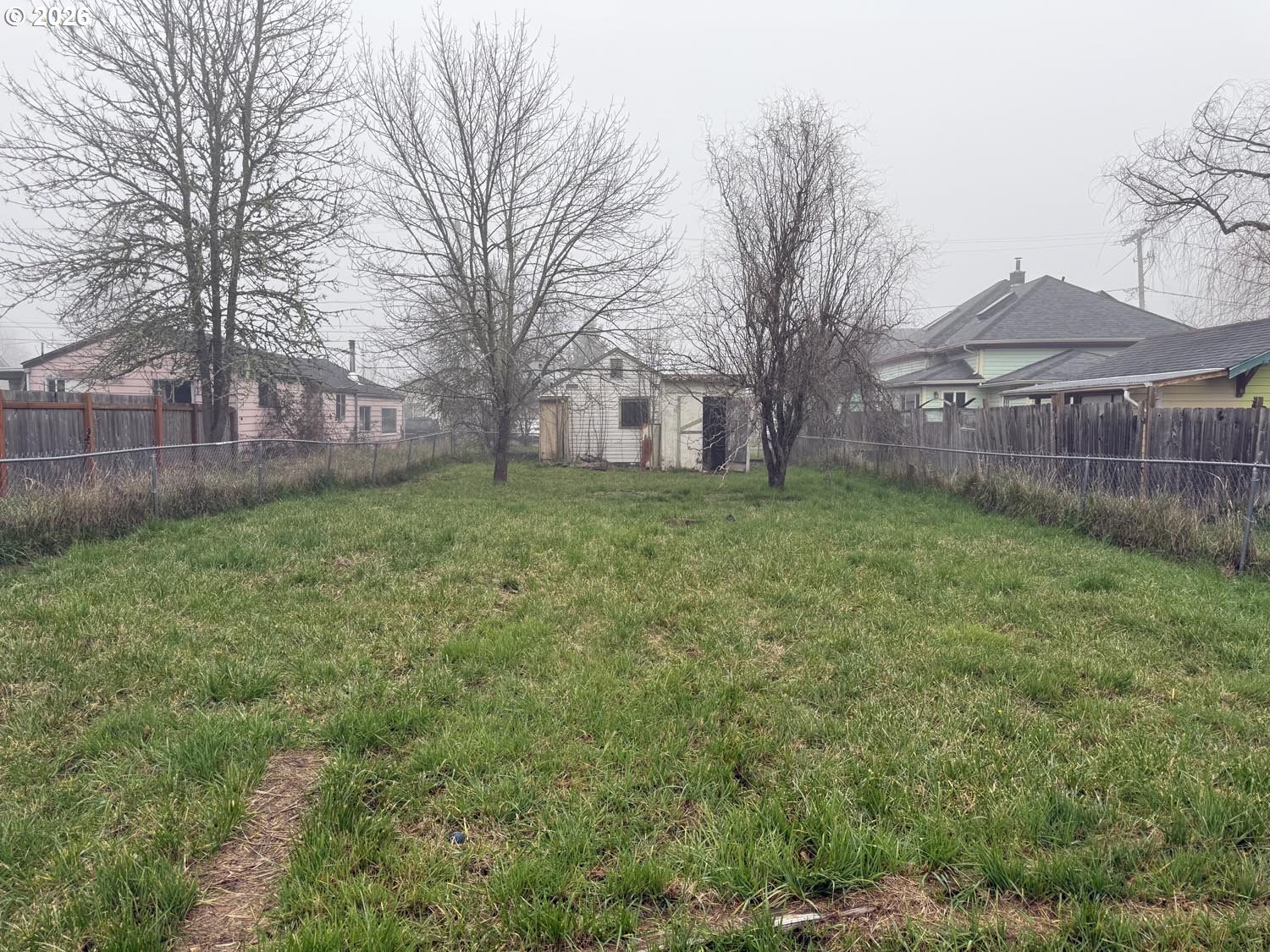 660 East 32nd Avenue Eugene, OR 97405 - Photo 3 of 6 a view of a yard with a house
