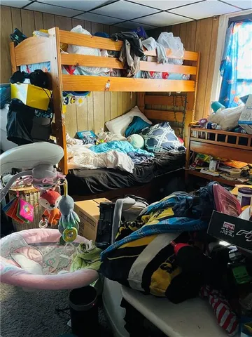 a bed room with a bed and a couch