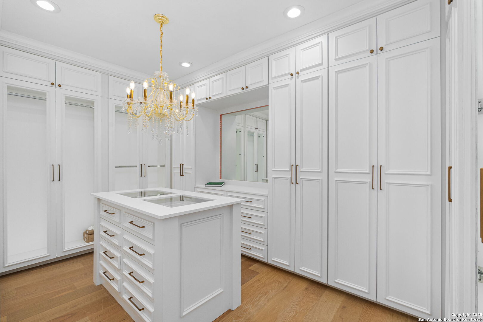 718 Ridgemont Avenue Terrell Hills, TX 78209 - Photo 23 of 39 a spacious bathroom with a granite countertop sink a mirror a vanity and a shower