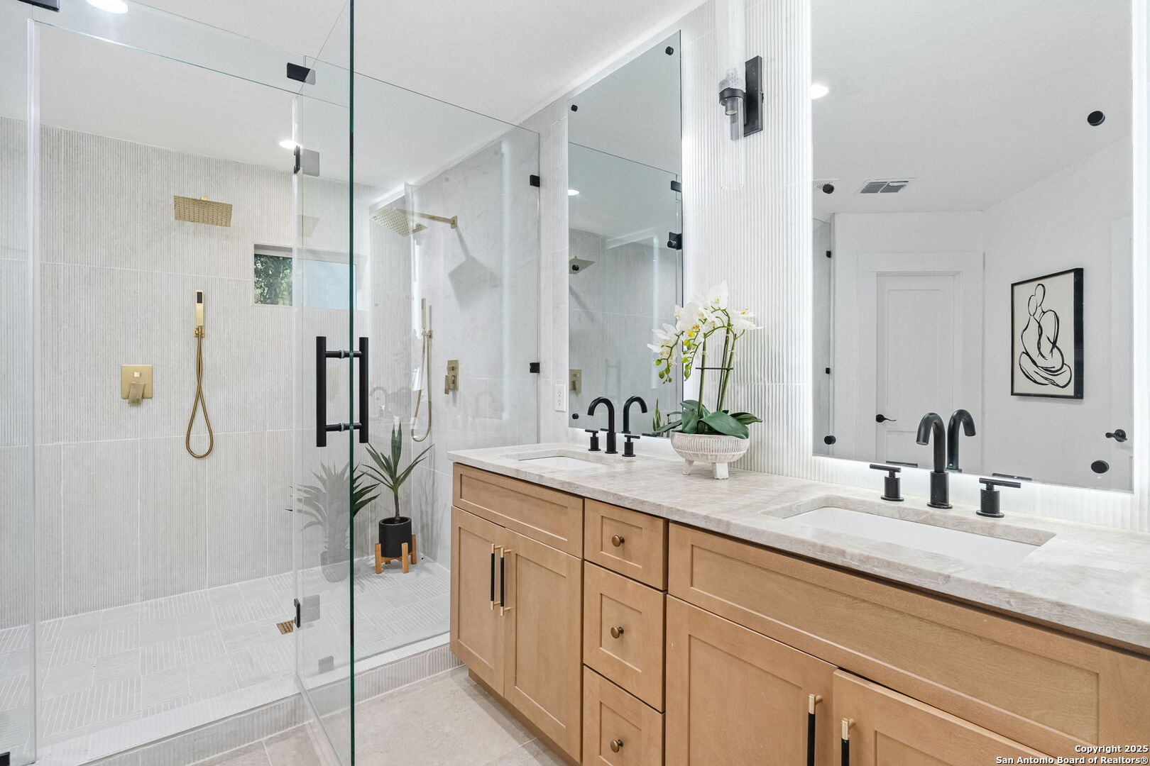 718 Ridgemont Avenue Terrell Hills, TX 78209 - Photo 25 of 39 a bathroom with a shower sink and mirror