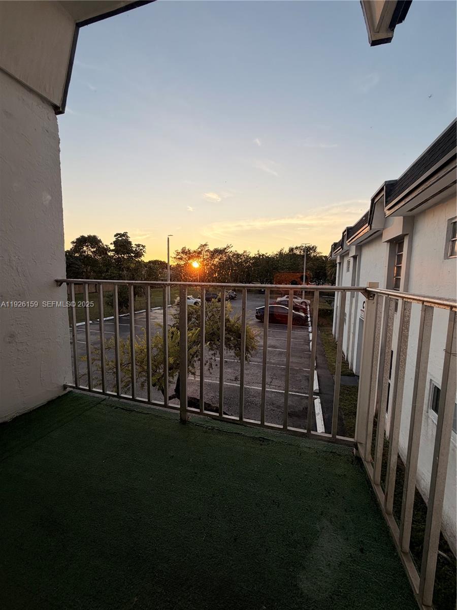 7250 Southwest 94th Place, Unit B8 Miami, FL 33173 - Photo 16 of 18 a view of a backyard with a garden