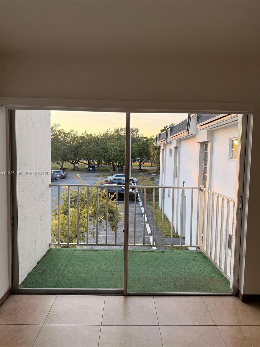 7250 Southwest 94th Place, Unit B8 Miami, FL 33173 - Photo 3 of 18 a view of outdoor space and yard