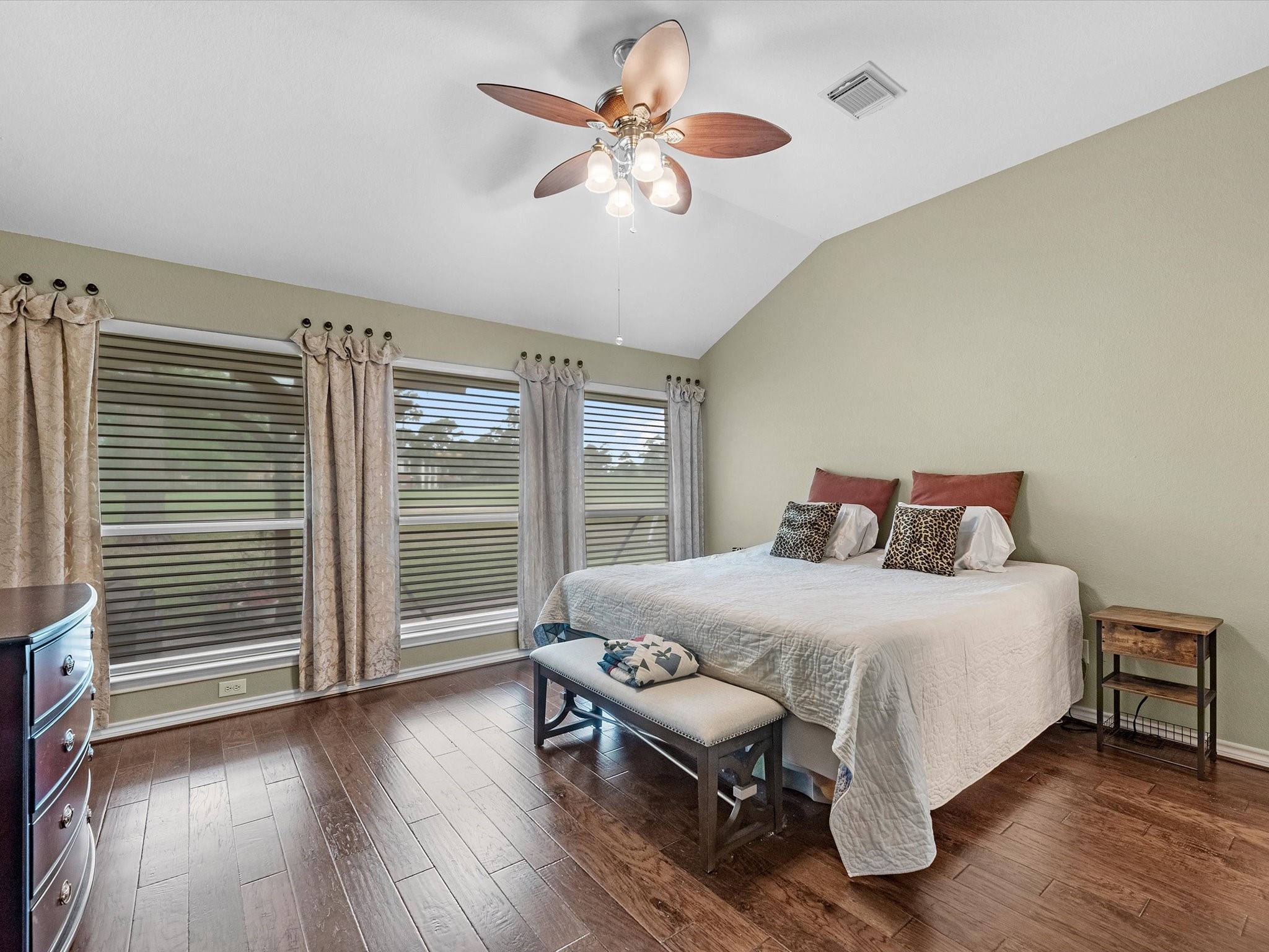 19019 Relay Road Humble, TX 77346 - Photo 20 of 31 a bedroom with a bed and a chandelier