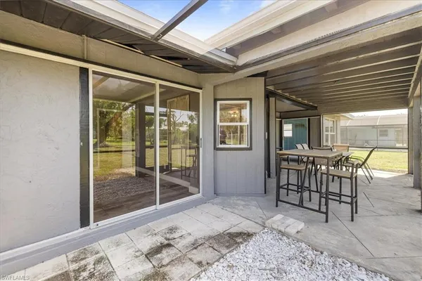 a room with furniture and a window