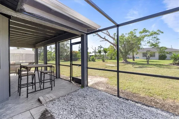 a view of a porch with a backyard