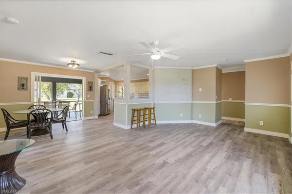 a view of work space with wooden floor