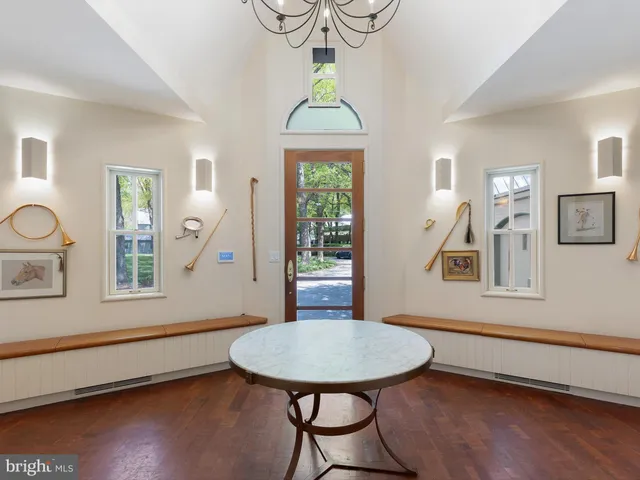 a room with a desk and a window