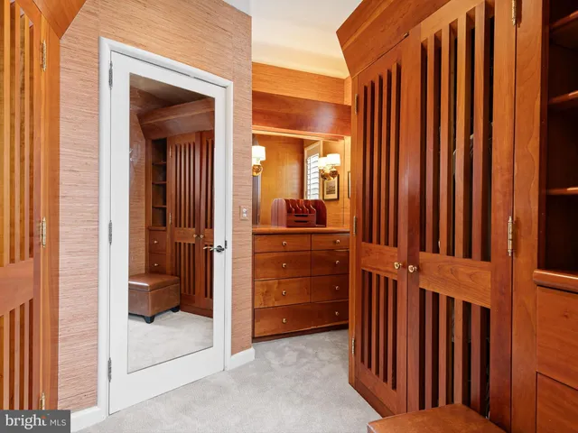 a view of a storage & utility room with two washing machine