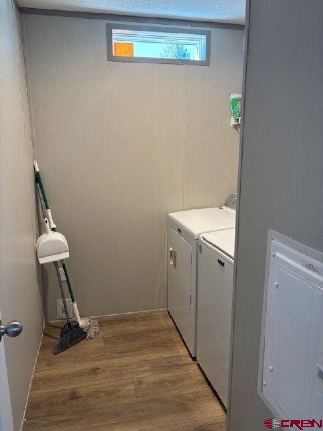 260 Southwest 13th Circle Cedaredge, CO 81413 - Photo 15 of 15 a view of a hallway with wooden floor and closet