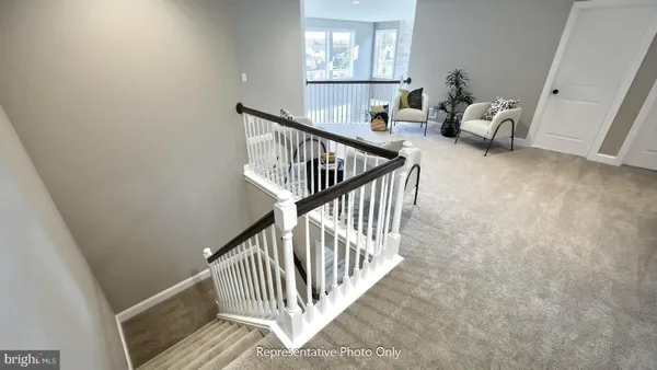 a view of entryway with livingroom