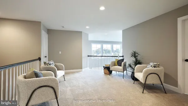 a living room with furniture and window