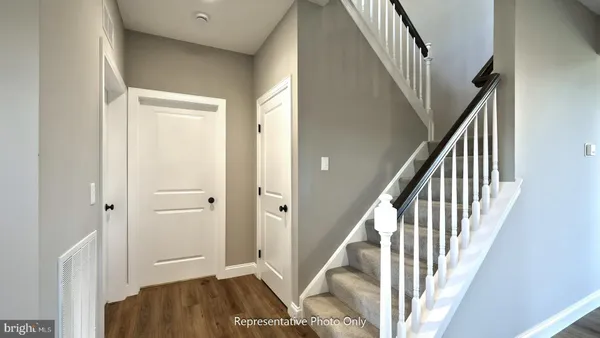 a view of an entryway with staircase