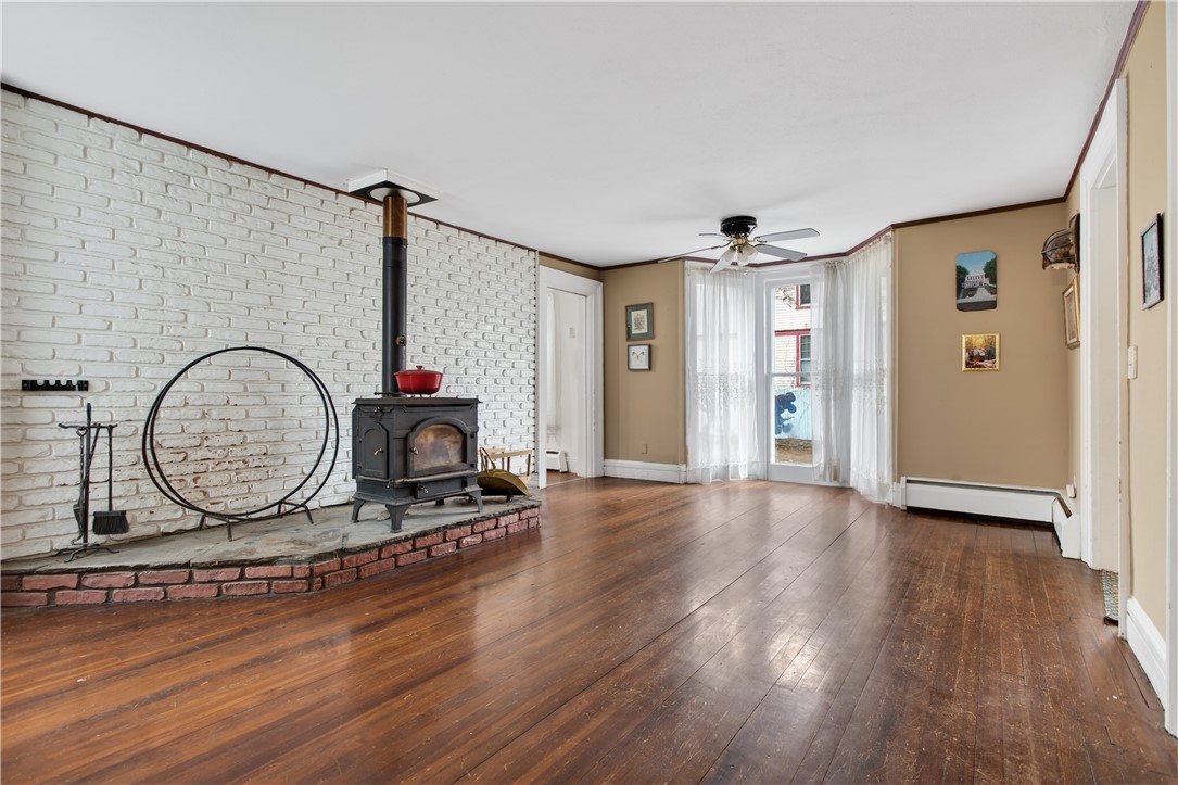 161 Main Street Unadilla, NY 13849 - Photo 8 of 28 Wood Stove Room