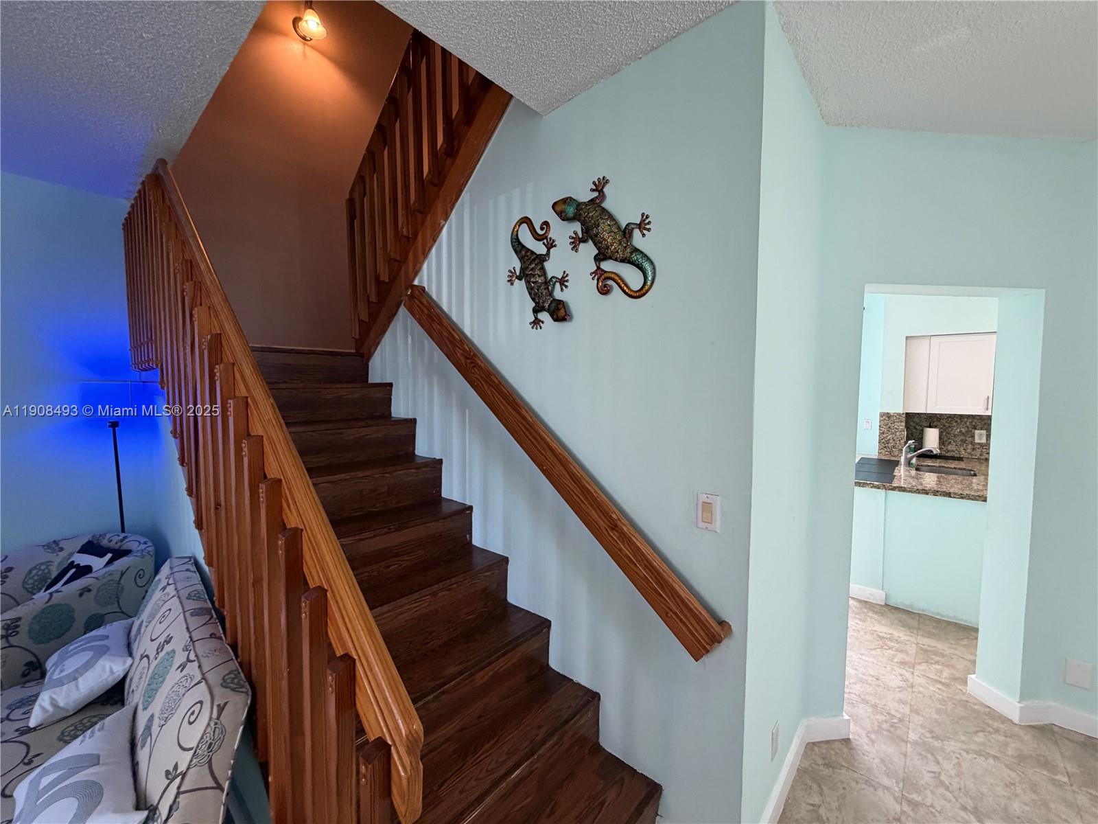 810 Northeast 212th Terrace, Unit 2 Miami, FL 33179 - Photo 15 of 44 a view of entryway and hall