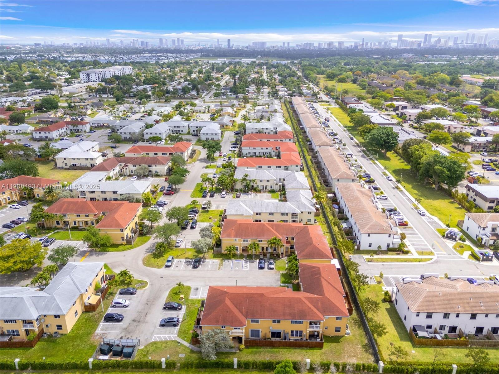 810 Northeast 212th Terrace, Unit 2 Miami, FL 33179 - Photo 44 of 44 an aerial view of residential houses with outdoor space