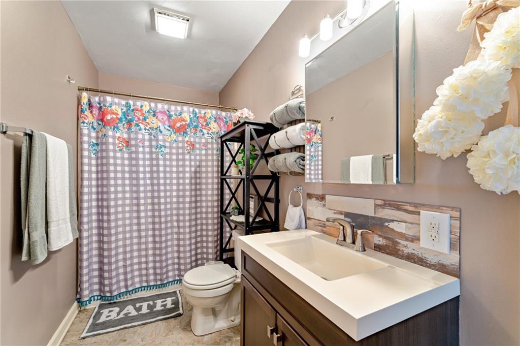 508 Joffre Bulger Road Joffre, PA 15053 - Photo 19 of 38 a bathroom with a sink toilet and shower
