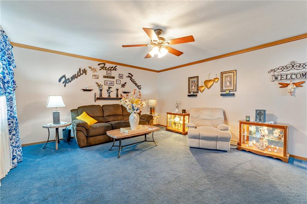 508 Joffre Bulger Road Joffre, PA 15053 - Photo 4 of 38 a living room with furniture and a chandelier