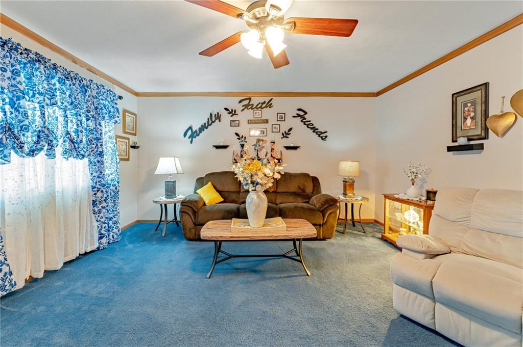 508 Joffre Bulger Road Joffre, PA 15053 - Photo 6 of 38 a living room with furniture and a chandelier