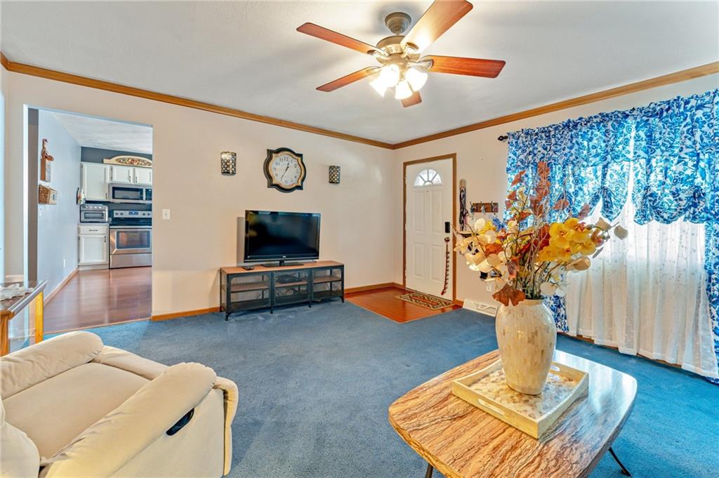 508 Joffre Bulger Road Joffre, PA 15053 - Photo 7 of 38 a living room with furniture and a flat screen tv