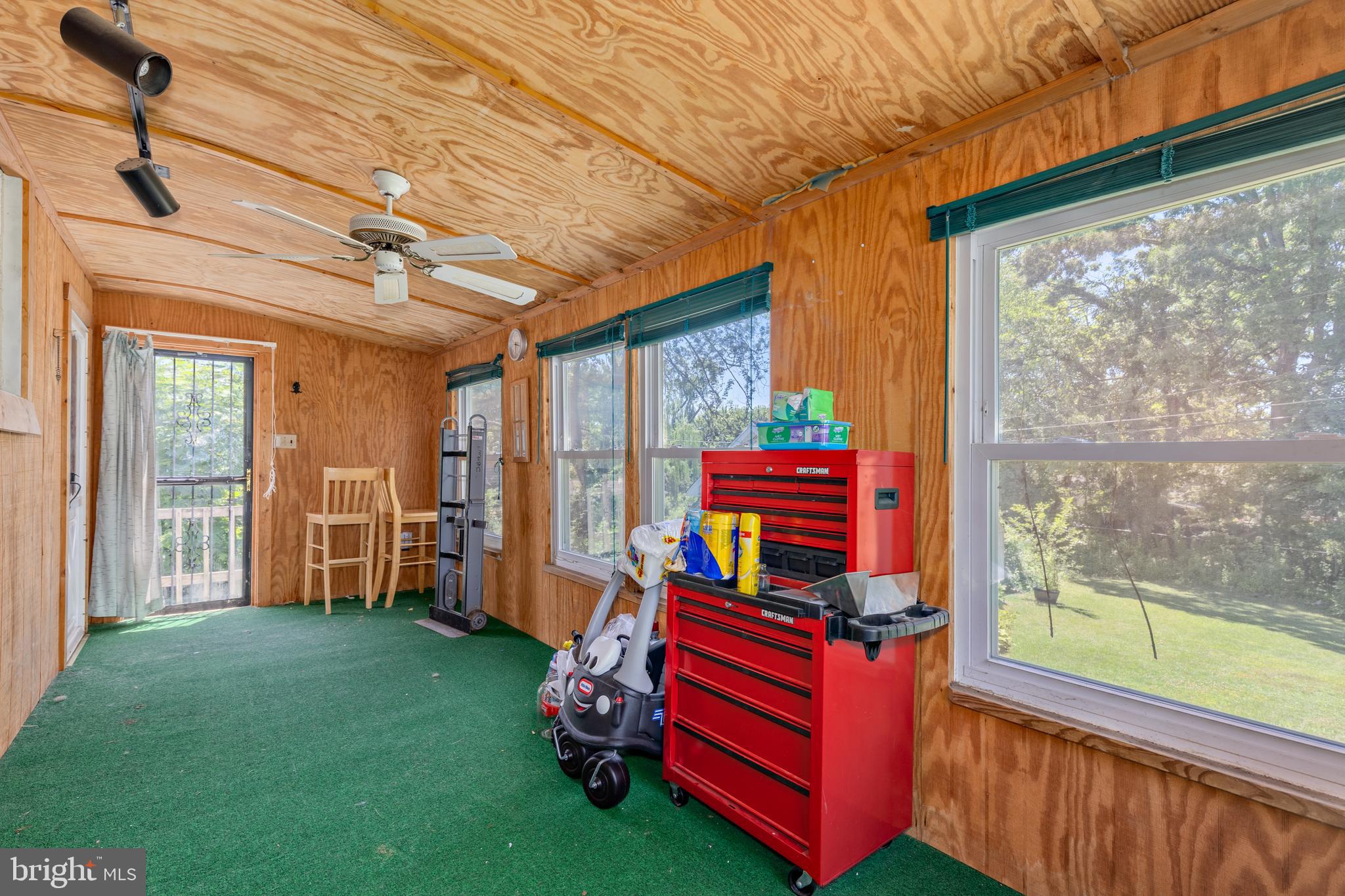 6426 Sherwood Road Baltimore, MD 21239 - Photo 33 of 43 a room with pool table and windows