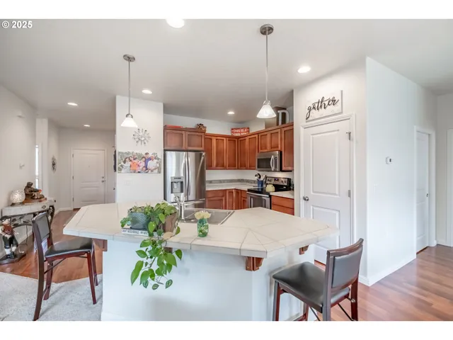 a kitchen with lots of counter top space and appliances