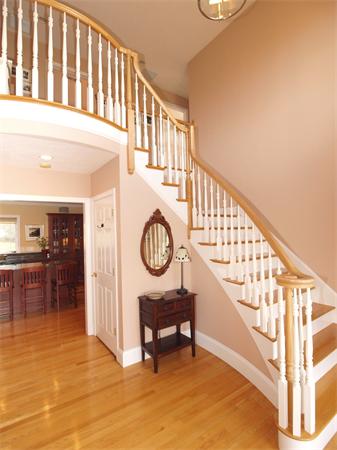 6 Spectacle Hill Road Bolton, MA 01740 - Photo 14 of 28 a view of entryway with dining room and hall with wooden floor