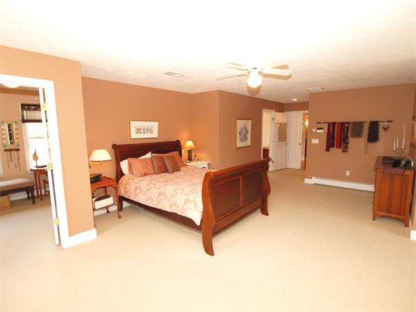 6 Spectacle Hill Road Bolton, MA 01740 - Photo 18 of 28 a bedroom with a bed and view