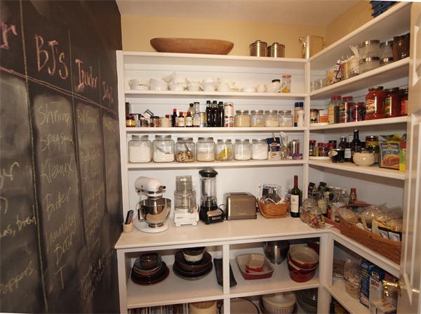 6 Spectacle Hill Road Bolton, MA 01740 - Photo 4 of 28 a kitchen with a refrigerator and a stove
