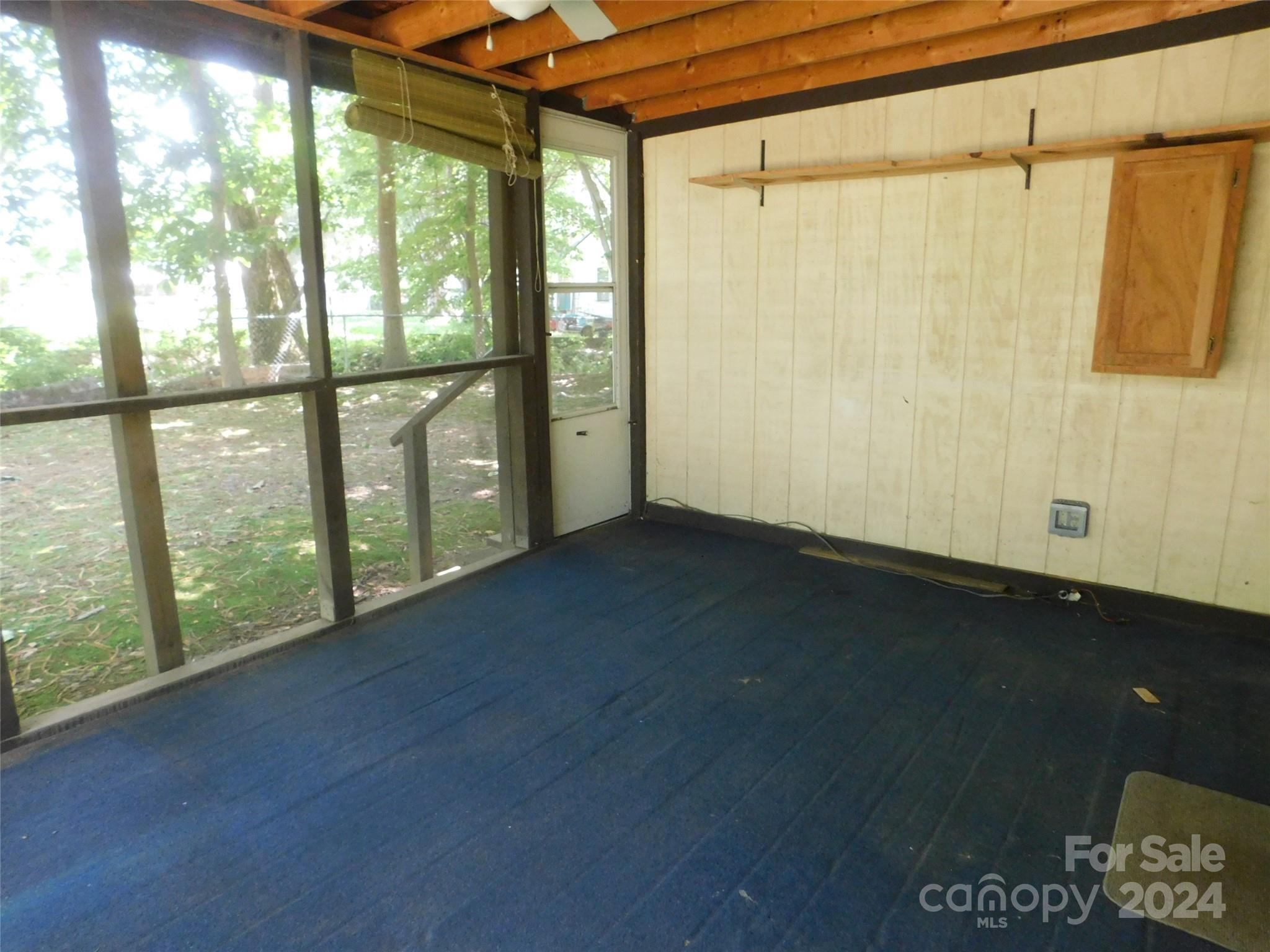 146 Browning Road Waynesville, NC 28786 - Photo 25 of 32 a view of an empty room with a window