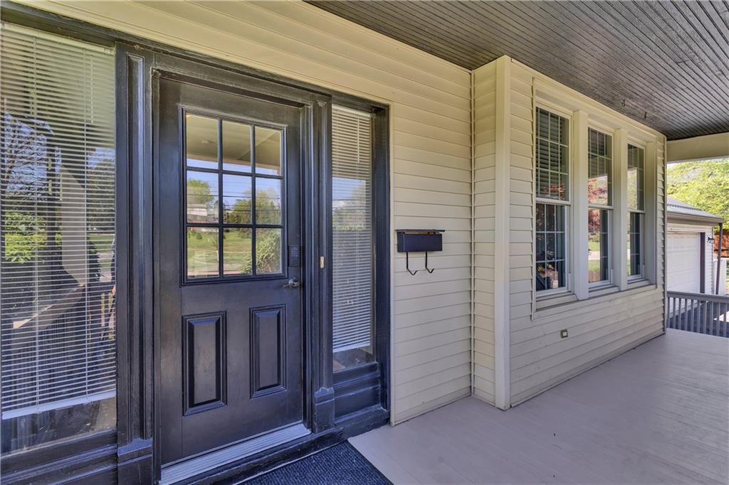 1226 Mayview Road Pittsburgh, PA 15241 - Photo 7 of 42 The inviting front entry creates a warm welcome, framed by charming details that hint at the character found throughout the home.