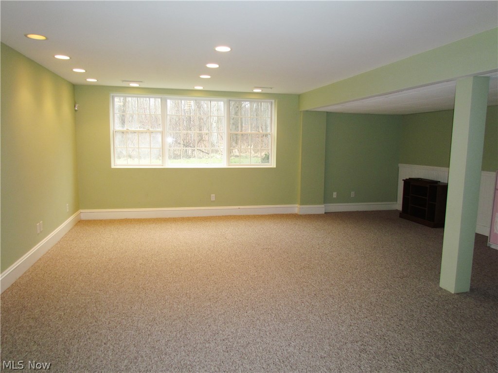 10780 Bell Road Newbury, OH 44065 - Photo 24 of 31 Lower level rec room with large daylight windows