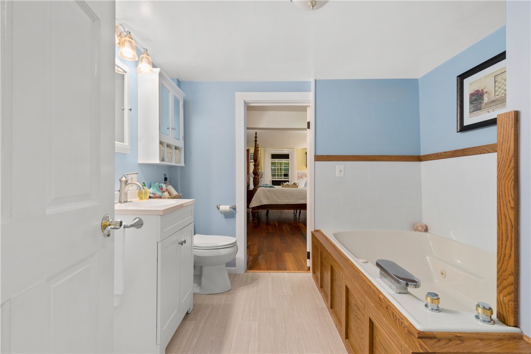422 Waterman Hill Road Coventry, RI 02827 - Photo 11 of 39 Large updated master bathroom with jet tub and stand-up shower (behind door to left in photo)