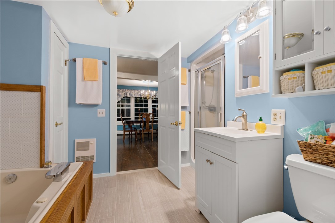 422 Waterman Hill Road Coventry, RI 02827 - Photo 12 of 39 Another view of master bathroom with dining room beyond