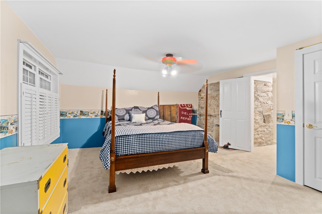 422 Waterman Hill Road Coventry, RI 02827 - Photo 21 of 39 Second floor bedroom - this was originally the master of original home. (Note another fireplace behind the door)
This room features brand new carpeting as well.