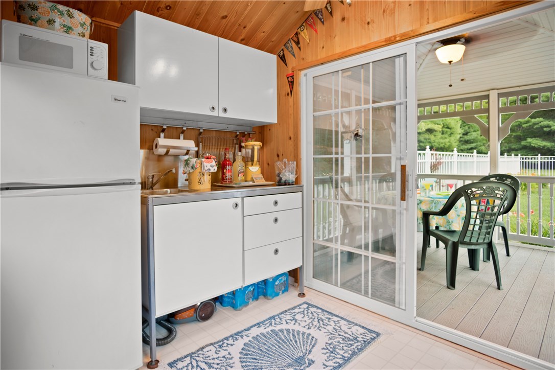422 Waterman Hill Road Coventry, RI 02827 - Photo 36 of 39 Cabana kitchen with screened in porch