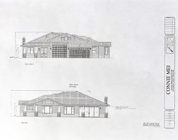 a view of a field with an ocean