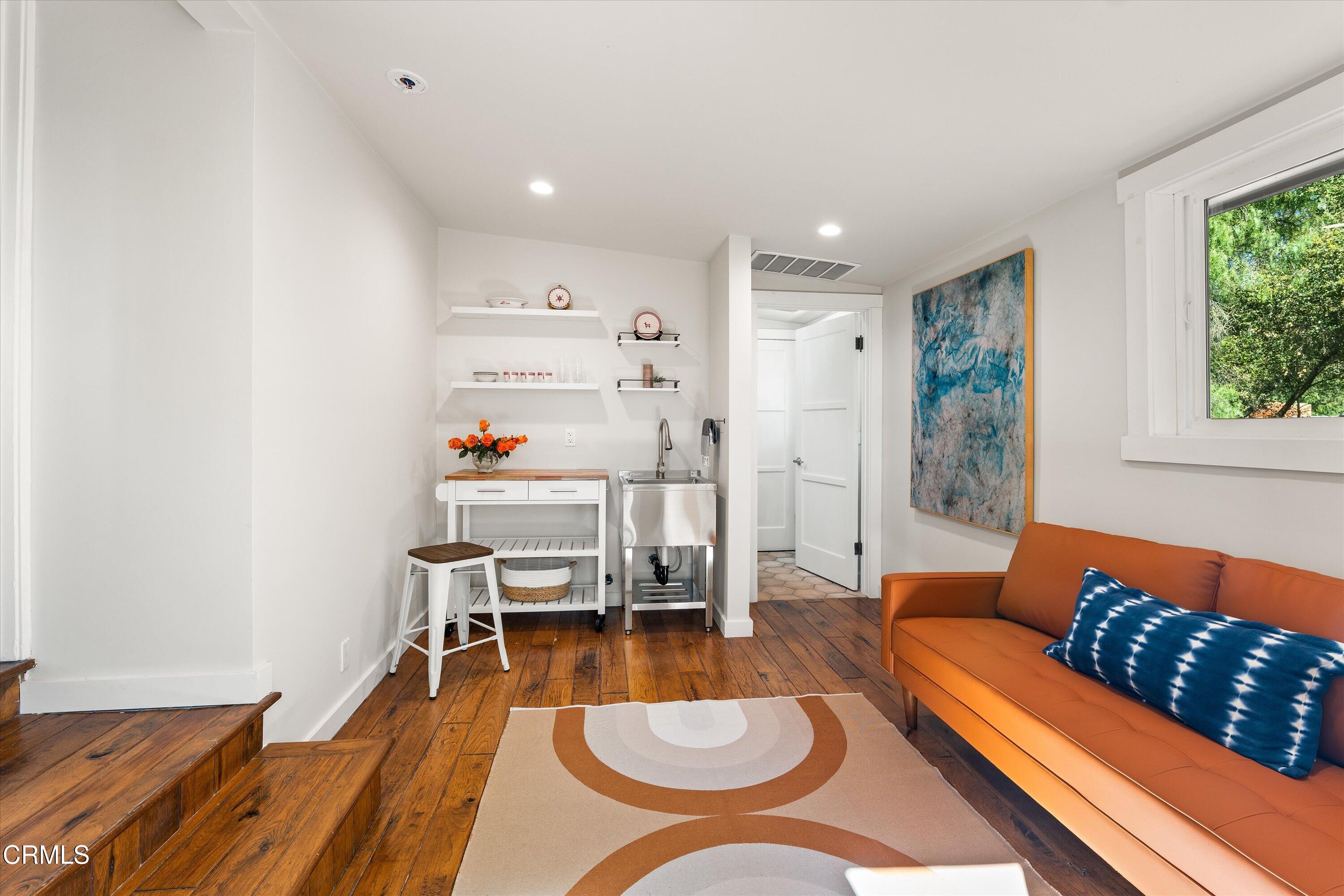 3541 Thacher Road Ojai, CA 93023 - Photo 17 of 50 a living room with furniture and a wooden floor