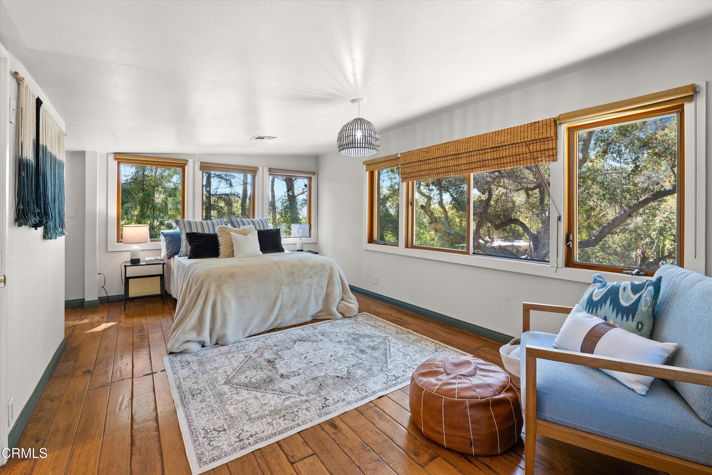 3541 Thacher Road Ojai, CA 93023 - Photo 20 of 50 a bedroom with a large bed and a window